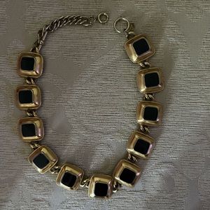 Gold and black necklace